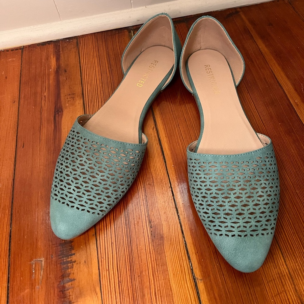 Never worn “Restricted” turquoise flats
